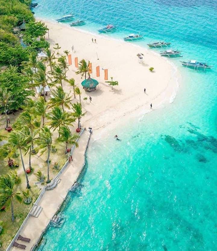 Bantayan Island shoreline with white sand and turquoise water